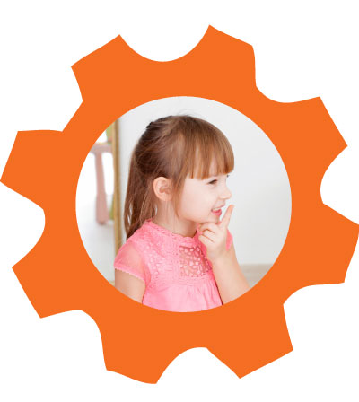 Speech-language pathologist working with a child during a play-based therapy session